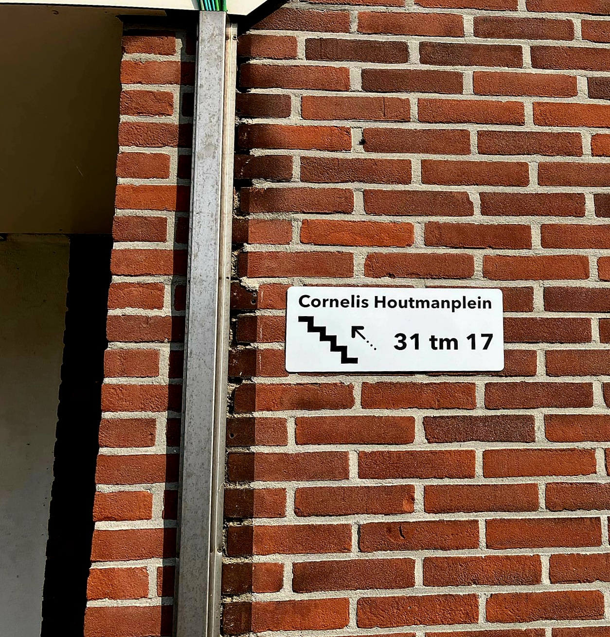 Bewegwijzering met huisnummers en etages
